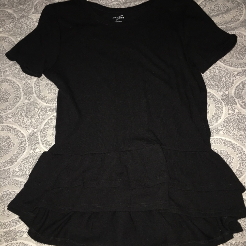 Francesca’s black ruffled bottom blouse
